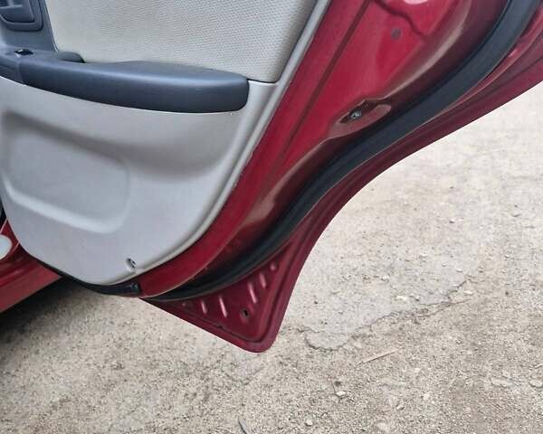 Красный Киа Черато, объемом двигателя 2 л и пробегом 233 тыс. км за 4700 $, фото 27 на Automoto.ua