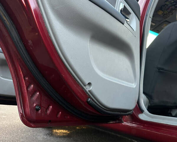 Красный Киа Черато, объемом двигателя 1.6 л и пробегом 212 тыс. км за 4500 $, фото 9 на Automoto.ua