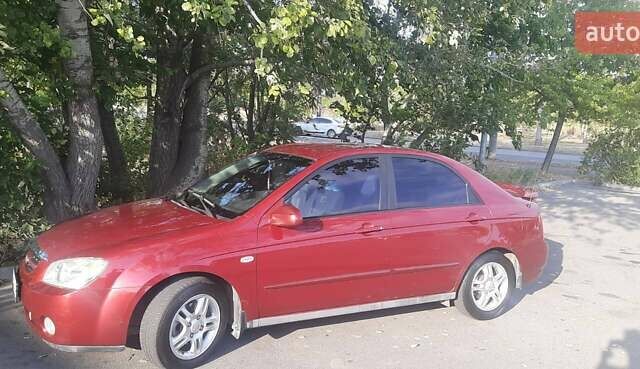 Красный Киа Черато, объемом двигателя 2 л и пробегом 144 тыс. км за 5400 $, фото 7 на Automoto.ua