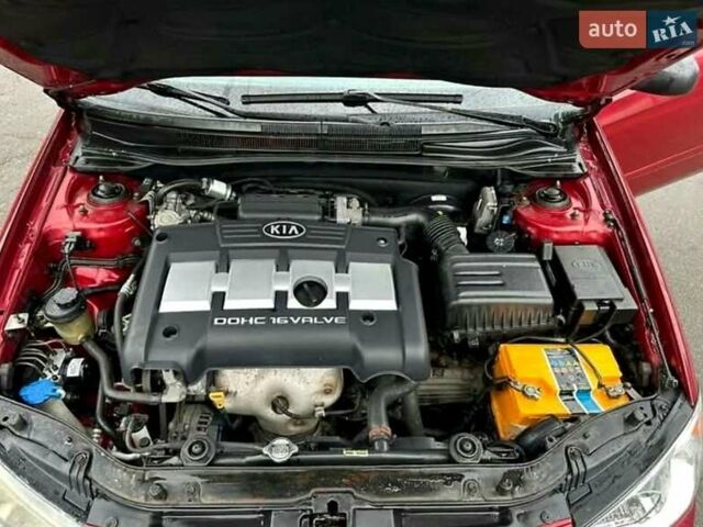 Красный Киа Черато, объемом двигателя 1.6 л и пробегом 229 тыс. км за 4500 $, фото 12 на Automoto.ua