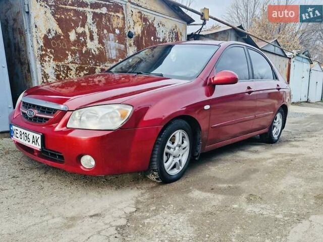 Красный Киа Черато, объемом двигателя 2 л и пробегом 233 тыс. км за 4700 $, фото 2 на Automoto.ua