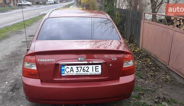 Красный Киа Черато, объемом двигателя 1.6 л и пробегом 229 тыс. км за 4500 $, фото 6 на Automoto.ua