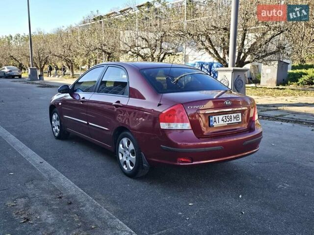 Красный Киа Черато, объемом двигателя 1.6 л и пробегом 200 тыс. км за 2600 $, фото 6 на Automoto.ua