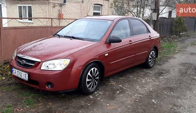 Красный Киа Черато, объемом двигателя 1.6 л и пробегом 229 тыс. км за 4500 $, фото 8 на Automoto.ua