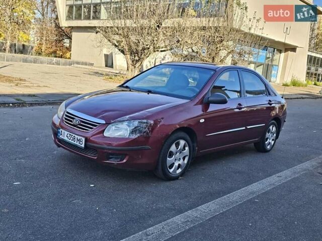 Красный Киа Черато, объемом двигателя 1.6 л и пробегом 200 тыс. км за 2600 $, фото 9 на Automoto.ua