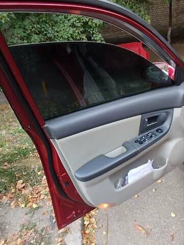 Красный Киа Черато, объемом двигателя 2 л и пробегом 140 тыс. км за 4500 $, фото 9 на Automoto.ua