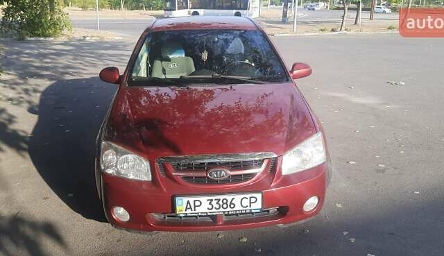 Красный Киа Черато, объемом двигателя 2 л и пробегом 144 тыс. км за 5400 $, фото 3 на Automoto.ua