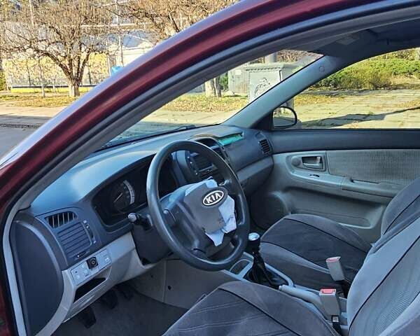 Красный Киа Черато, объемом двигателя 1.6 л и пробегом 200 тыс. км за 2600 $, фото 18 на Automoto.ua