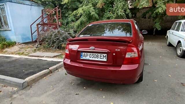 Красный Киа Черато, объемом двигателя 2 л и пробегом 140 тыс. км за 4500 $, фото 4 на Automoto.ua