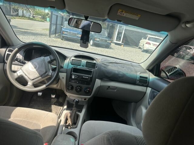 Красный Киа Черато, объемом двигателя 0 л и пробегом 123 тыс. км за 1500 $, фото 4 на Automoto.ua