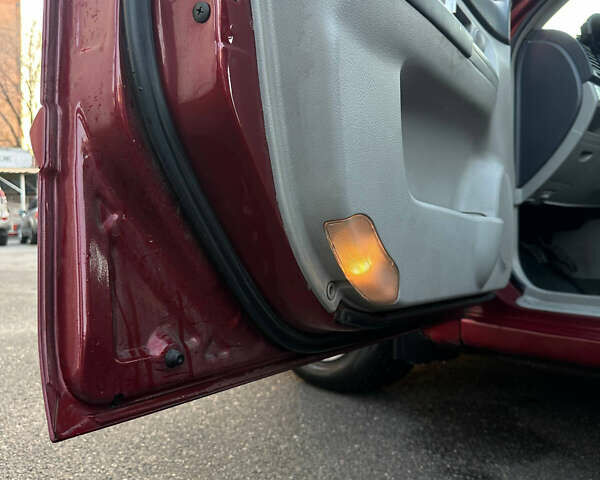 Красный Киа Черато, объемом двигателя 1.6 л и пробегом 212 тыс. км за 4500 $, фото 8 на Automoto.ua