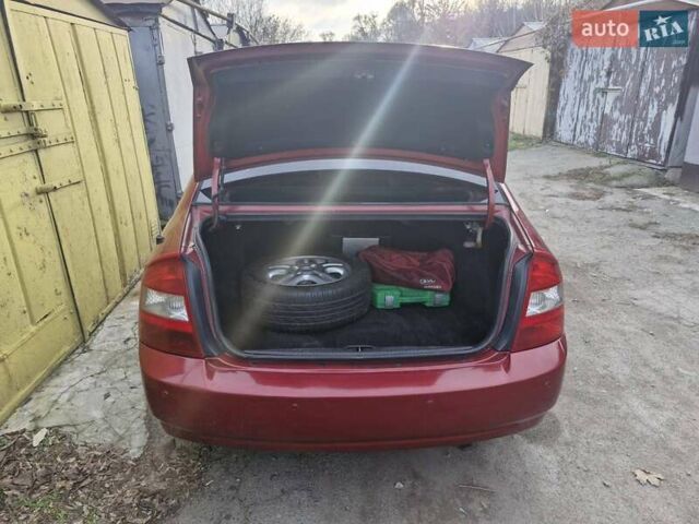 Красный Киа Черато, объемом двигателя 2 л и пробегом 233 тыс. км за 4700 $, фото 21 на Automoto.ua