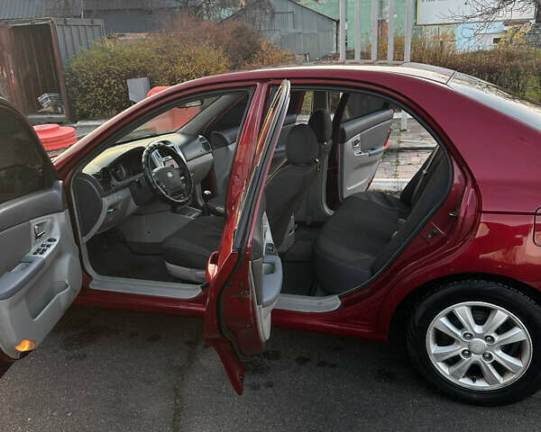 Красный Киа Черато, объемом двигателя 1.6 л и пробегом 212 тыс. км за 4500 $, фото 4 на Automoto.ua