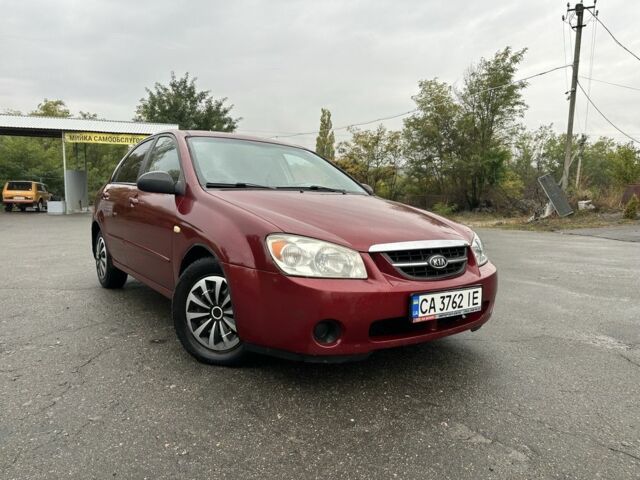 Красный Киа Черато, объемом двигателя 1.6 л и пробегом 228 тыс. км за 3850 $, фото 2 на Automoto.ua