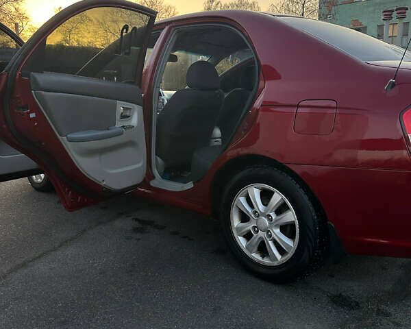 Красный Киа Черато, объемом двигателя 1.6 л и пробегом 212 тыс. км за 4500 $, фото 6 на Automoto.ua