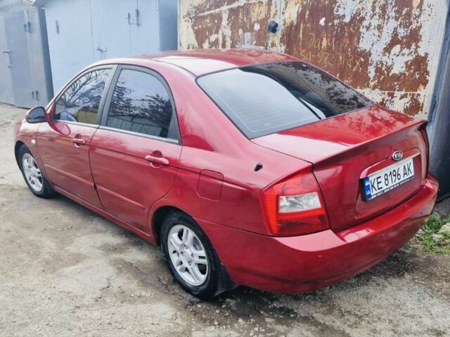 Красный Киа Черато, объемом двигателя 2 л и пробегом 233 тыс. км за 4700 $, фото 3 на Automoto.ua