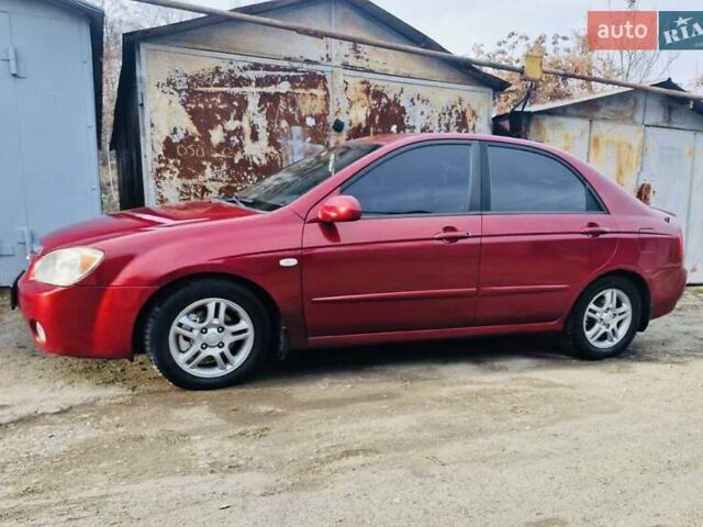 Красный Киа Черато, объемом двигателя 2 л и пробегом 233 тыс. км за 4700 $, фото 3 на Automoto.ua