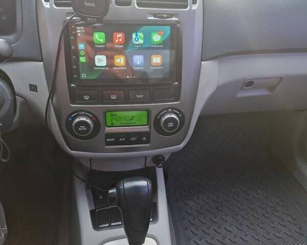 Красный Киа Черато, объемом двигателя 2 л и пробегом 233 тыс. км за 4700 $, фото 16 на Automoto.ua