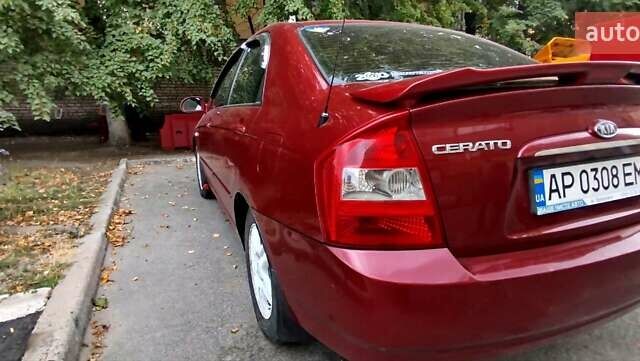 Красный Киа Черато, объемом двигателя 2 л и пробегом 140 тыс. км за 4500 $, фото 7 на Automoto.ua