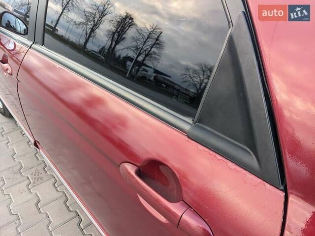 Красный Киа Черато, объемом двигателя 1.59 л и пробегом 240 тыс. км за 3750 $, фото 4 на Automoto.ua