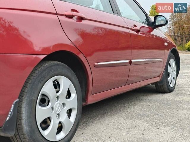 Червоний Кіа Черато, об'ємом двигуна 1.6 л та пробігом 188 тис. км за 4700 $, фото 6 на Automoto.ua