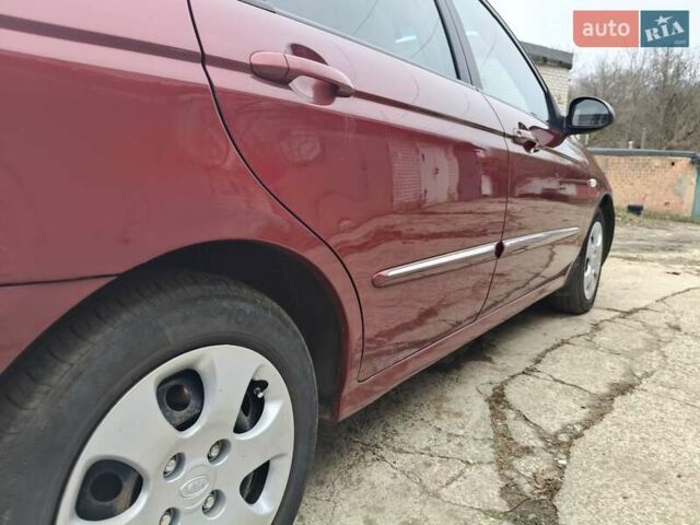 Червоний Кіа Черато, об'ємом двигуна 1.6 л та пробігом 188 тис. км за 4900 $, фото 7 на Automoto.ua