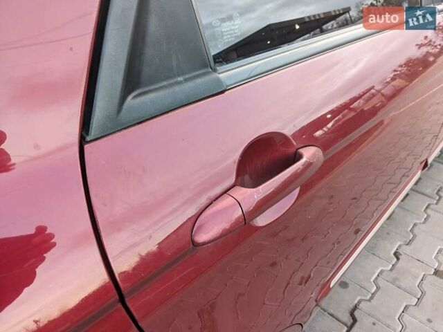 Красный Киа Черато, объемом двигателя 1.59 л и пробегом 240 тыс. км за 3750 $, фото 2 на Automoto.ua