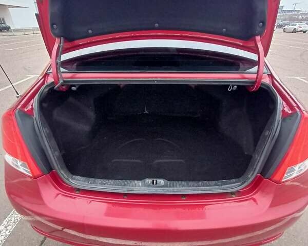 Червоний Кіа Черато, об'ємом двигуна 1.6 л та пробігом 118 тис. км за 5599 $, фото 8 на Automoto.ua