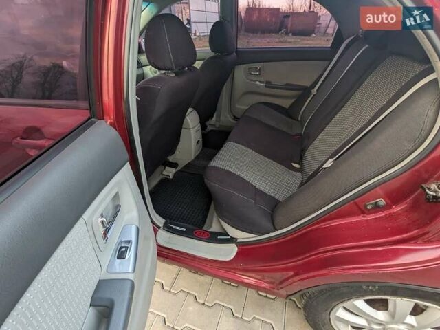 Красный Киа Черато, объемом двигателя 1.59 л и пробегом 240 тыс. км за 3750 $, фото 10 на Automoto.ua
