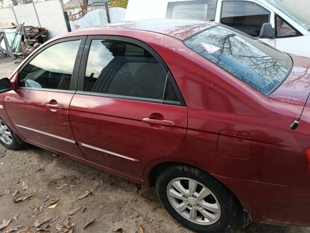 Красный Киа Черато, объемом двигателя 1.6 л и пробегом 240 тыс. км за 3300 $, фото 4 на Automoto.ua