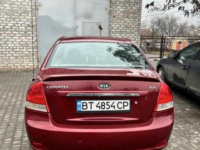 Красный Киа Черато, объемом двигателя 1.6 л и пробегом 232 тыс. км за 3600 $, фото 6 на Automoto.ua