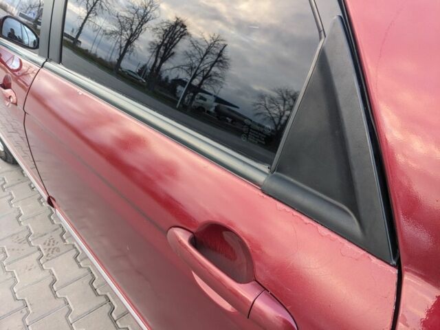 Красный Киа Черато, объемом двигателя 1.6 л и пробегом 240 тыс. км за 3750 $, фото 7 на Automoto.ua