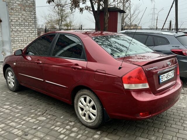 Красный Киа Черато, объемом двигателя 1.6 л и пробегом 232 тыс. км за 3600 $, фото 5 на Automoto.ua