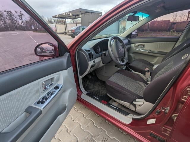 Красный Киа Черато, объемом двигателя 1.6 л и пробегом 240 тыс. км за 3750 $, фото 11 на Automoto.ua