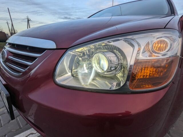 Красный Киа Черато, объемом двигателя 1.6 л и пробегом 240 тыс. км за 3750 $, фото 9 на Automoto.ua