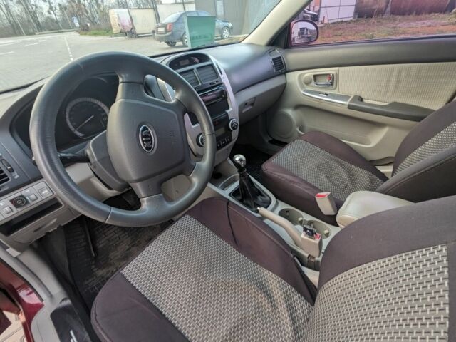 Красный Киа Черато, объемом двигателя 1.6 л и пробегом 240 тыс. км за 3750 $, фото 10 на Automoto.ua