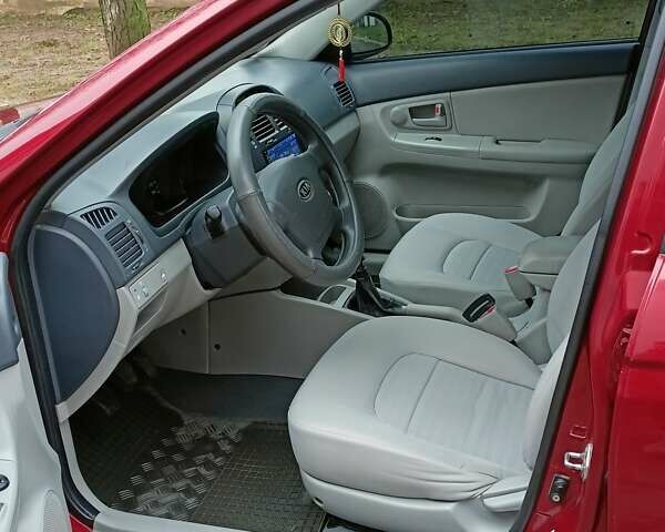 Червоний Кіа Черато, об'ємом двигуна 1.6 л та пробігом 118 тис. км за 5599 $, фото 10 на Automoto.ua