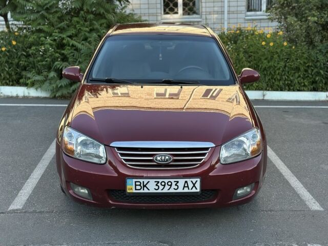 Червоний Кіа Черато, об'ємом двигуна 2 л та пробігом 260 тис. км за 4150 $, фото 1 на Automoto.ua
