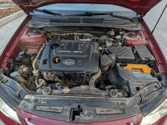 Красный Киа Черато, объемом двигателя 1.6 л и пробегом 240 тыс. км за 3750 $, фото 8 на Automoto.ua