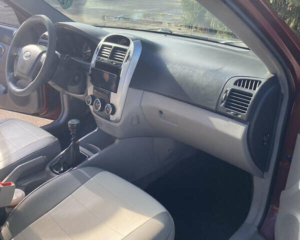 Червоний Кіа Черато, об'ємом двигуна 1.6 л та пробігом 239 тис. км за 4900 $, фото 6 на Automoto.ua