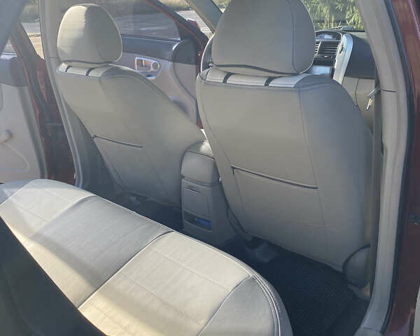 Червоний Кіа Черато, об'ємом двигуна 1.6 л та пробігом 239 тис. км за 4900 $, фото 5 на Automoto.ua