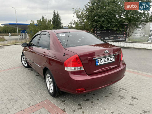 Красный Киа Черато, объемом двигателя 1.6 л и пробегом 225 тыс. км за 4200 $, фото 20 на Automoto.ua