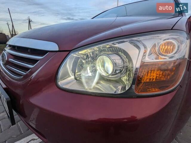 Красный Киа Черато, объемом двигателя 1.59 л и пробегом 240 тыс. км за 3750 $, фото 3 на Automoto.ua