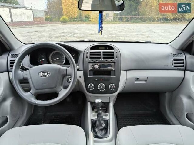 Червоний Кіа Черато, об'ємом двигуна 1.6 л та пробігом 188 тис. км за 4900 $, фото 11 на Automoto.ua