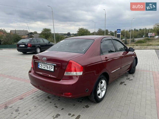 Красный Киа Черато, объемом двигателя 1.6 л и пробегом 225 тыс. км за 4200 $, фото 23 на Automoto.ua