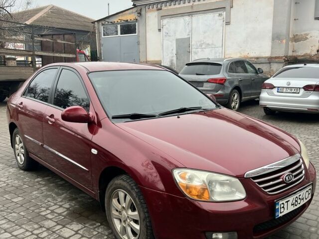 Красный Киа Черато, объемом двигателя 1.6 л и пробегом 232 тыс. км за 3600 $, фото 2 на Automoto.ua