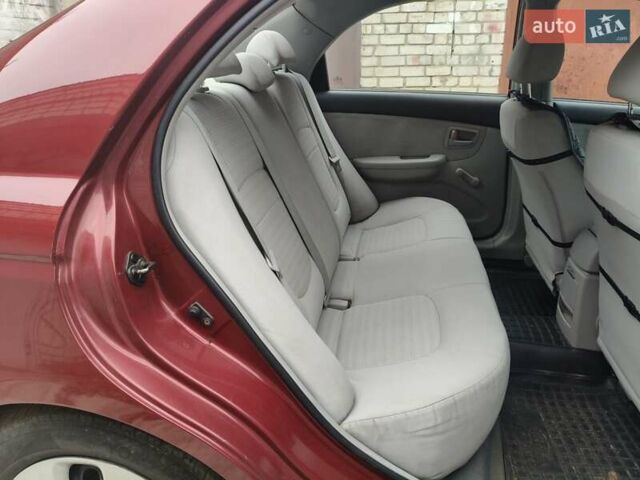 Червоний Кіа Черато, об'ємом двигуна 1.6 л та пробігом 188 тис. км за 4900 $, фото 8 на Automoto.ua