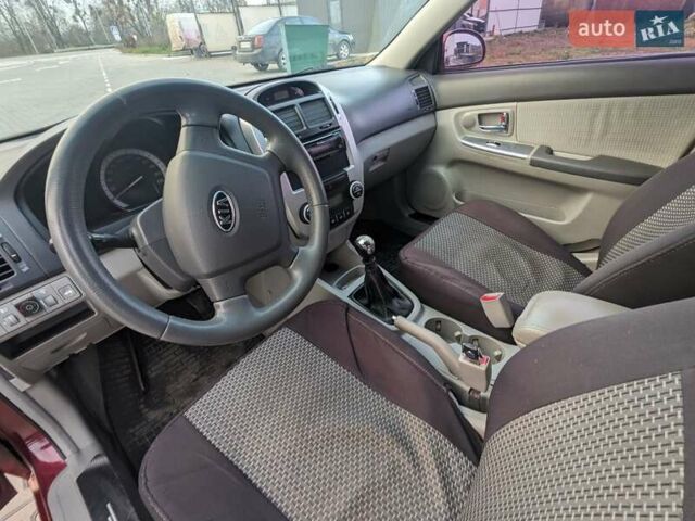 Красный Киа Черато, объемом двигателя 1.59 л и пробегом 240 тыс. км за 3750 $, фото 11 на Automoto.ua