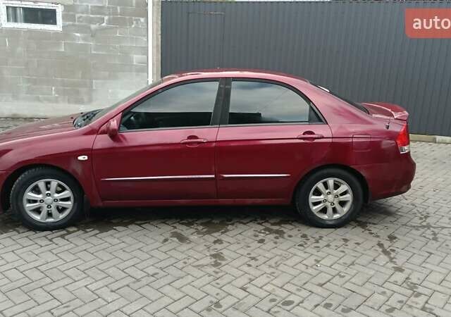 Червоний Кіа Черато, об'ємом двигуна 1.59 л та пробігом 245 тис. км за 3300 $, фото 3 на Automoto.ua