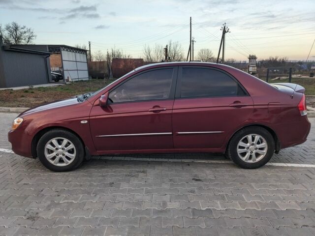 Красный Киа Черато, объемом двигателя 1.6 л и пробегом 240 тыс. км за 3750 $, фото 1 на Automoto.ua